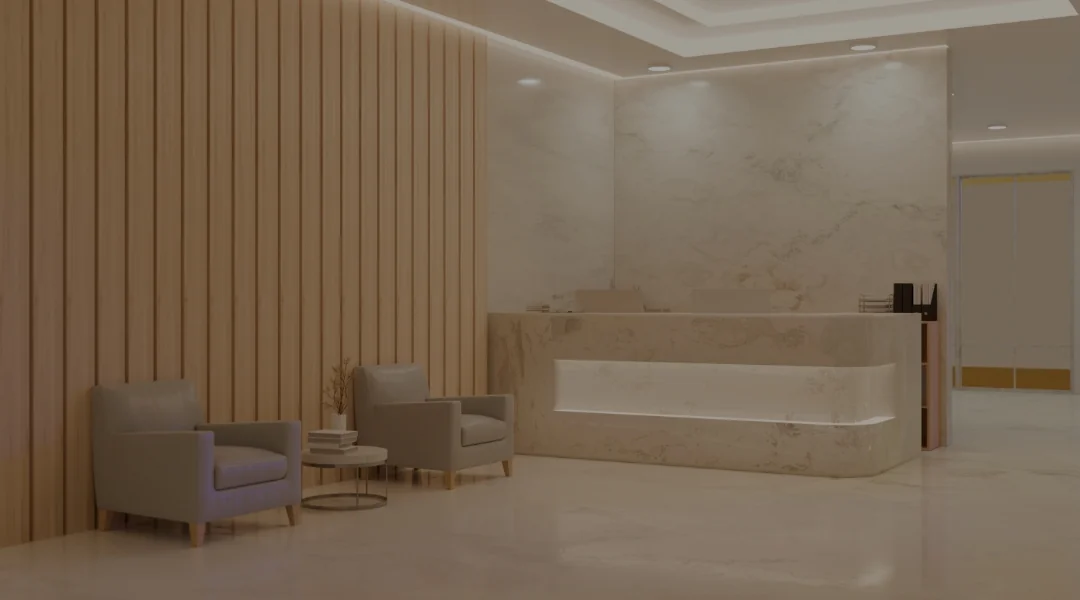 病院の受付エリア、椅子とテーブルが配置されている